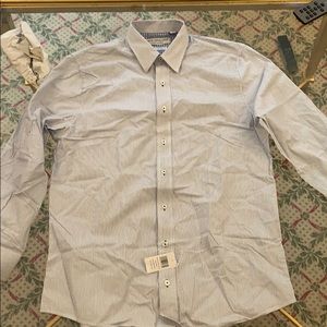 Brand New! Mens button up shirt.